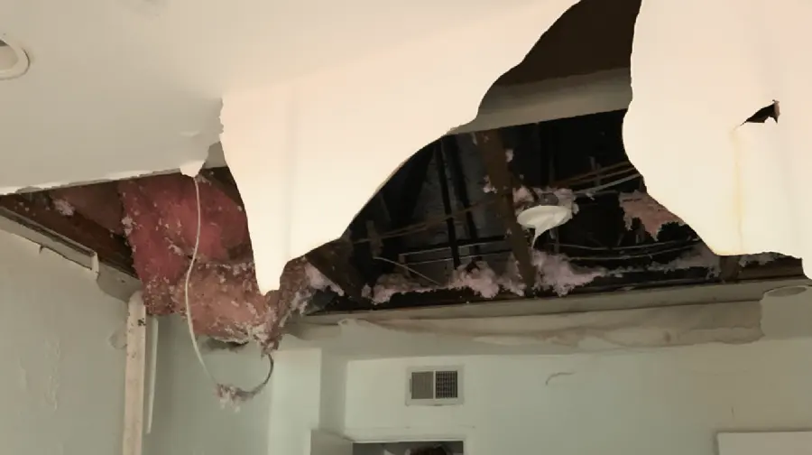 Water-stained sagging ceiling from a leak above in an Encino, CA home
