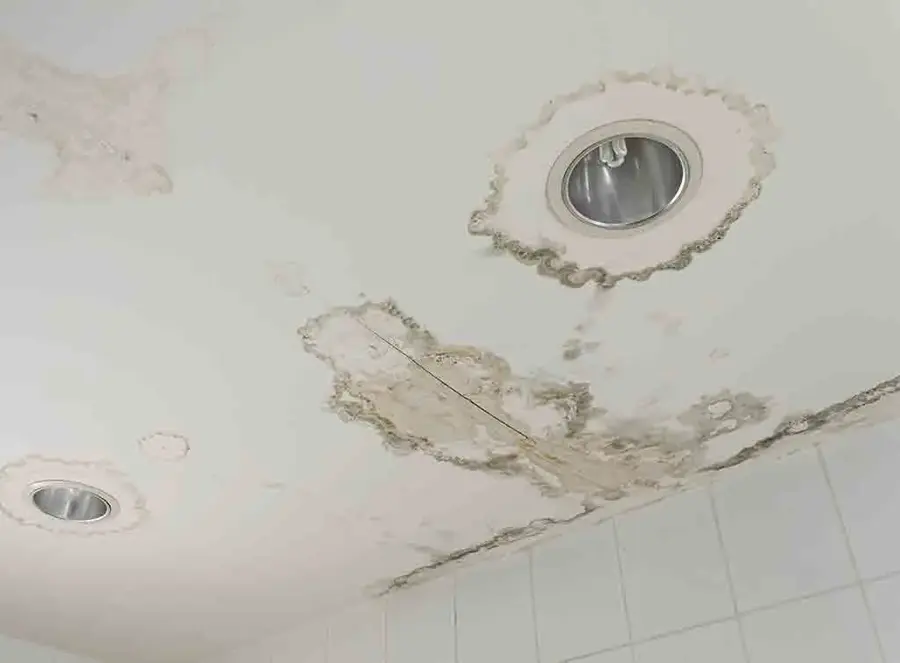 Water intrusion under a roof at the ceiling line during a storm in Encino, CA