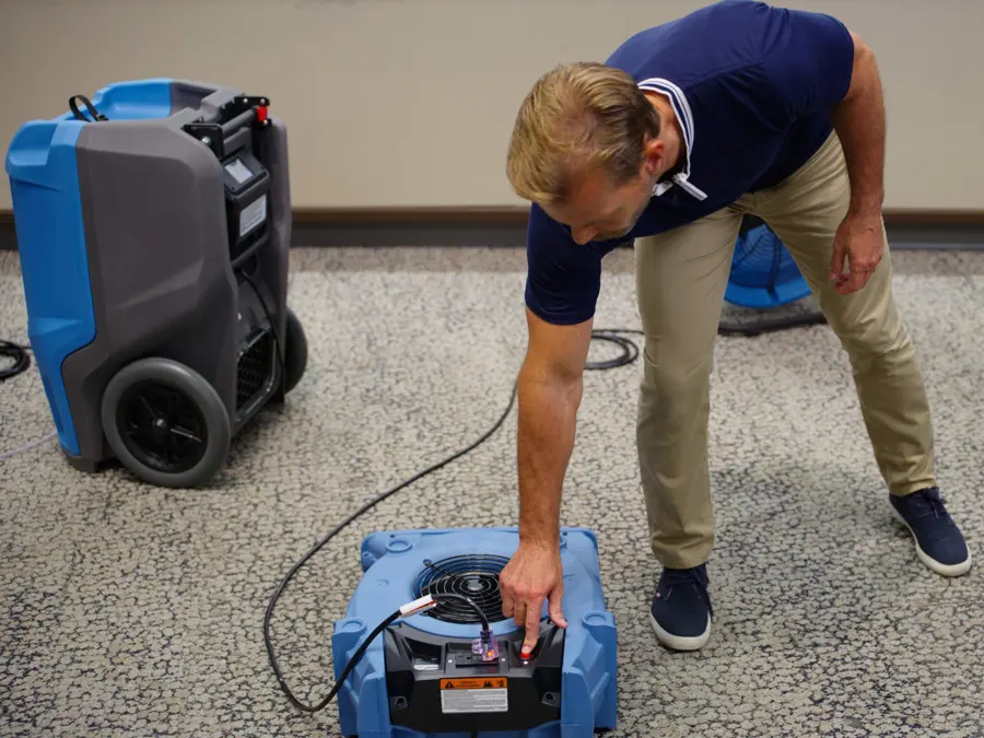 Air movers and a dehumidifier drying a structure in an Encino, CA home